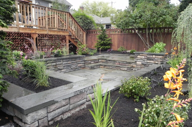 Boulder retaining wall — slope stabilization project